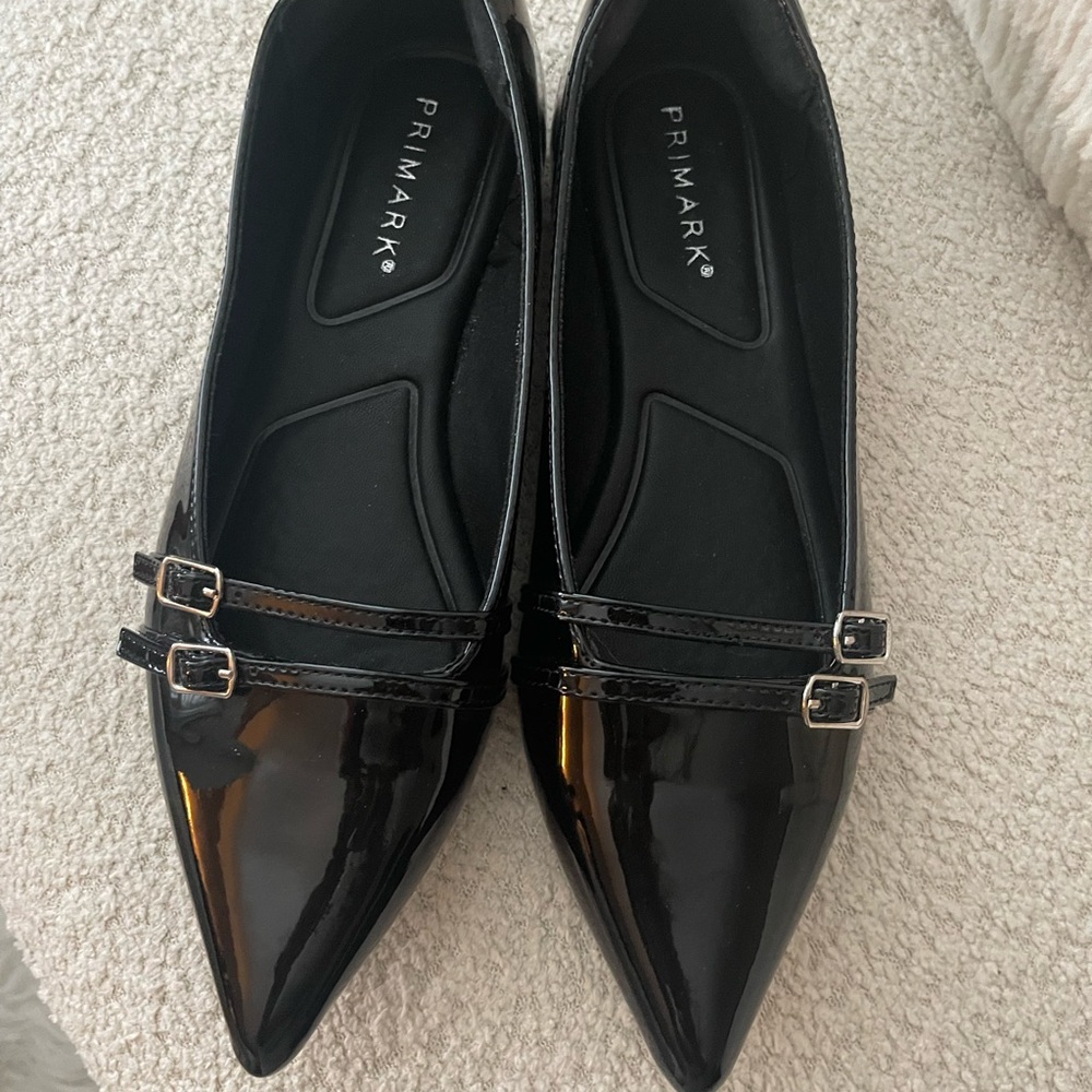 Black Patent Flats with Silver Buckle Details